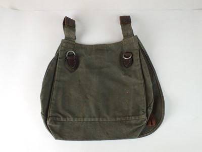 Lot 153 - German WW2 bread bag and three gas cape pouches