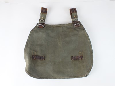 Lot 153 - German WW2 bread bag and three gas cape pouches