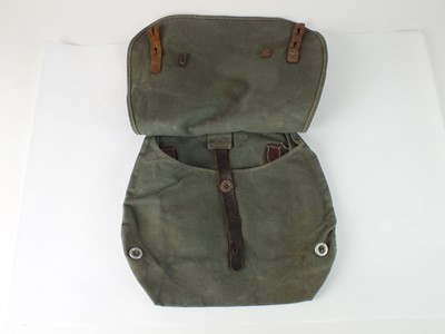 Lot 153 - German WW2 bread bag and three gas cape pouches