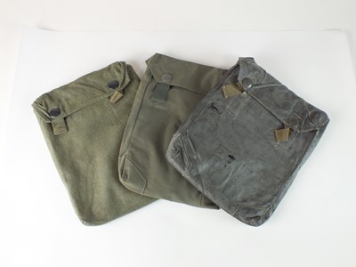 Lot 153 - German WW2 bread bag and three gas cape pouches
