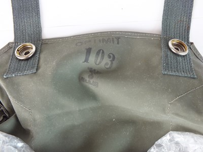 Lot 153 - German WW2 bread bag and three gas cape pouches