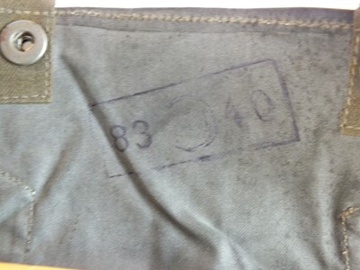 Lot 153 - German WW2 bread bag and three gas cape pouches