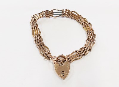 Lot 68 - A rose metal four bar gate link bracelet