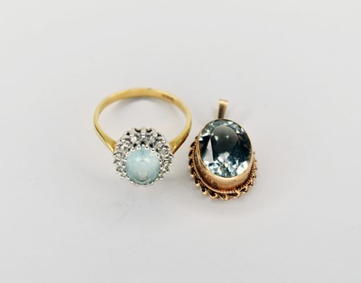 Lot 82 - An 18ct gold aquamarine and white stone cluster ring