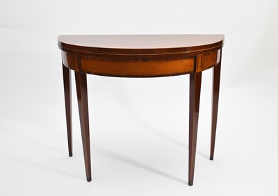 Lot 320 - A George III mahogany and satinwood, demi-lune card table