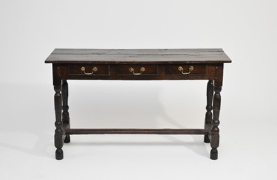 Lot 543 - An 18th century oak side table