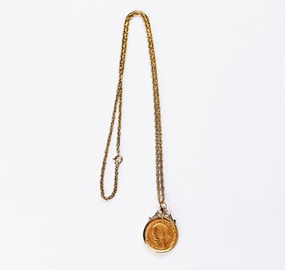 Lot 67 - A George V sovereign on chain