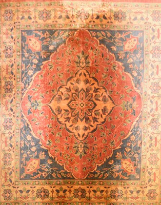 Lot 566 - A Persian Tabriz pattern carpet