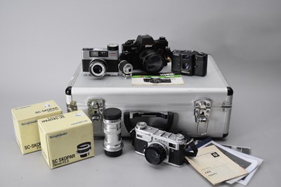 Lot 400 - A group of Soviet cameras and associated lenses