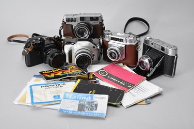 Lot 261 - A Nikon 35mm SLR and various other roll film cameras