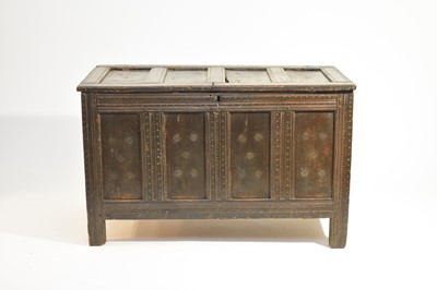 Lot 340 - A 17th century, stained coffer, possibly fruitwood