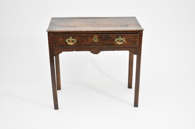 Lot 556 - An 18th century elm and oak side table