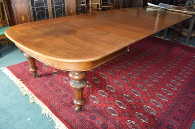 Lot 536 - A large Victorian, natural oak, telescopic, extending dining room table