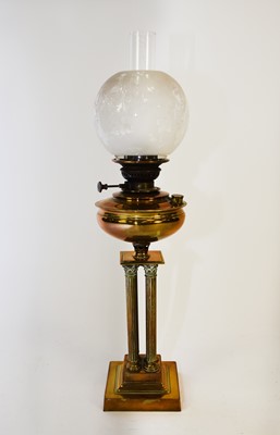 Lot 471 - A brass oil lamp, circa 1900