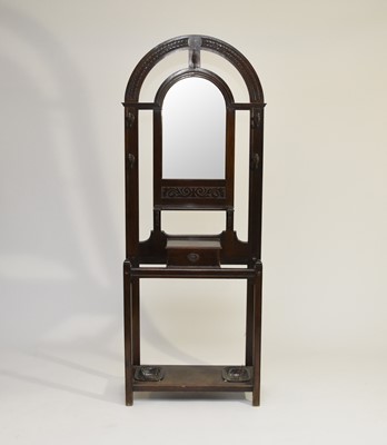 Lot 517 - A 1920s stained oak hallstand