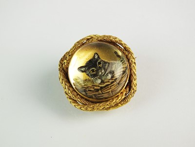 Lot 146 - A reverse carved intaglio rock crystal brooch depicting a cat