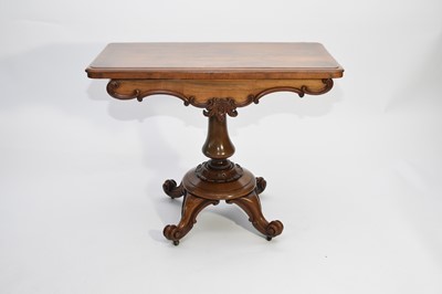 Lot 502 - A Victorian rosewood fold-over card table