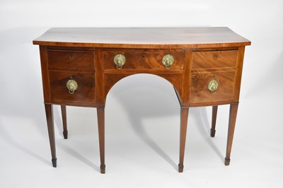 Lot 503 - A George III mahogany bow-front sideboard