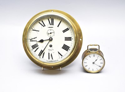 Lot 452 - A Smith Astral brass cased bulkhead timepiece and a small desk clock