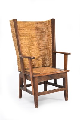 Lot 339 - An oak framed Orkney armchair attributed to Liberty & Co.