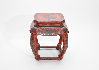 Lot 337 - A Chinese red lacquer urn stand and a red lacquer low table