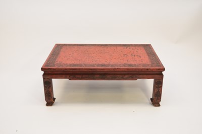 Lot 337 - A Chinese red lacquer urn stand and a red lacquer low table