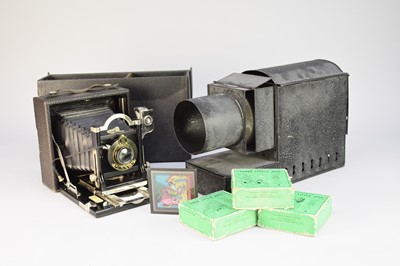 Lot 404 - An Ensign Junior magic lantern and a Premo plate camera