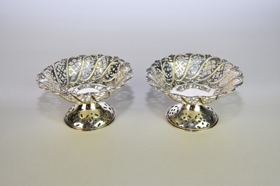 Lot 31 - A pair of silver pierced pedestal bon bon dishes