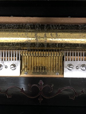 Lot 345 - A 19th century Swiss, burr walnut organ celeste type music box, the air sheet with 12 airs