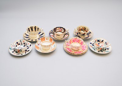 Lot 182 - A group of English porcelain teacups and saucers, early-mid 19th century including Coalport