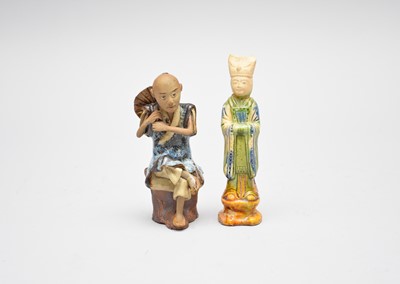 Lot 210 - Two Chinese earthenware figures