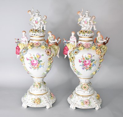 Lot 314 - A large pair of impressive German porcelain vases, covers and stands, mid-20th century