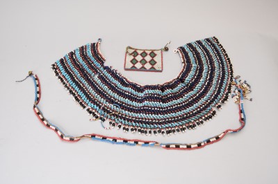 Lot 364 - A Xhosa beadwork collar and other African tribal works