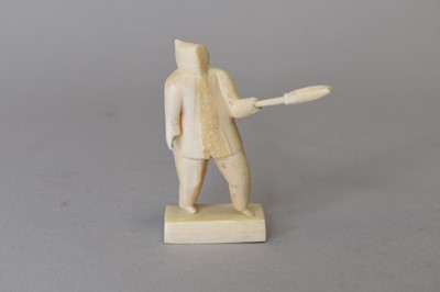 Lot 368 - A small North American Inuit carved figure