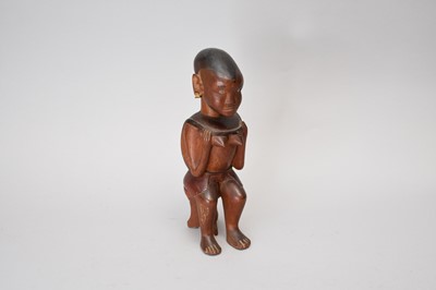 Lot 371 - A carved wood Kamba tribal figure, Kenya, East Africa