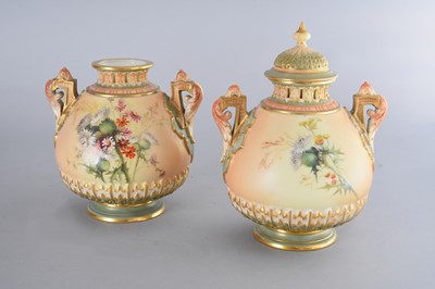 Lot 252 - A pair of Royal Worcester blush ivory pot pourri vases