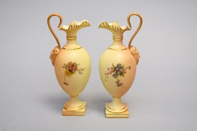 Lot 254 - A pair of Royal Worcester blush ivory ewers