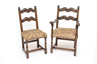 Lot 517 - A set of five 17th century style carved oak dining chairs