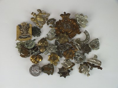 Lot 283 - A collection of 30 assorted army badges to...