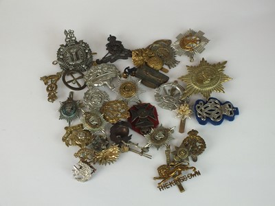 Lot 282 - A collection of 30 assorted army badges...