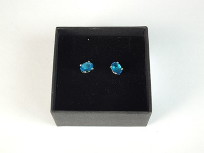 Lot 97 - A pair of neon apatite stud earrings