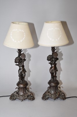 Lot 269 - A pair of bronze figural table lamps