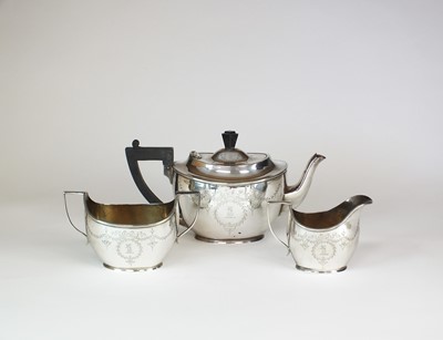 Lot 124 - An early 20th century three piece silver tea service
