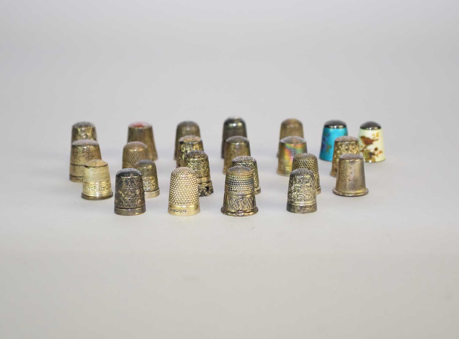 Lot 20 - A collection of twenty-three silver thimbles