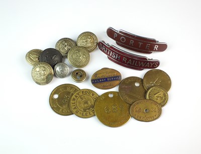 Lot 221 - A collection of transport badges, tokens and buttons