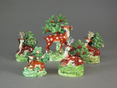 Lot 292 - Five Staffordshire models of deer