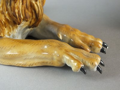 Lot 310 - A pair of Meissen models of a lion and lioness