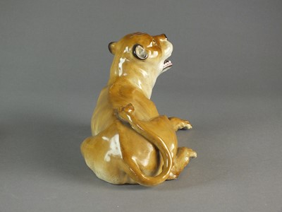 Lot 310 - A pair of Meissen models of a lion and lioness