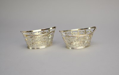 Lot 22 - A pair of late Victorian pierced silver bon bon dishes