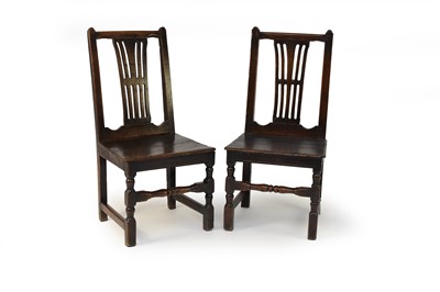 Lot 686 - A good pair of 18th century, heavy, rustic oak chairs